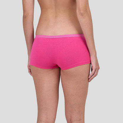 Person wearing a Dice bright pink underwear on a plain background