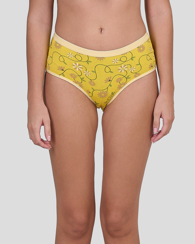 Dice Yellow patterned underwear worn by a person on a plain background