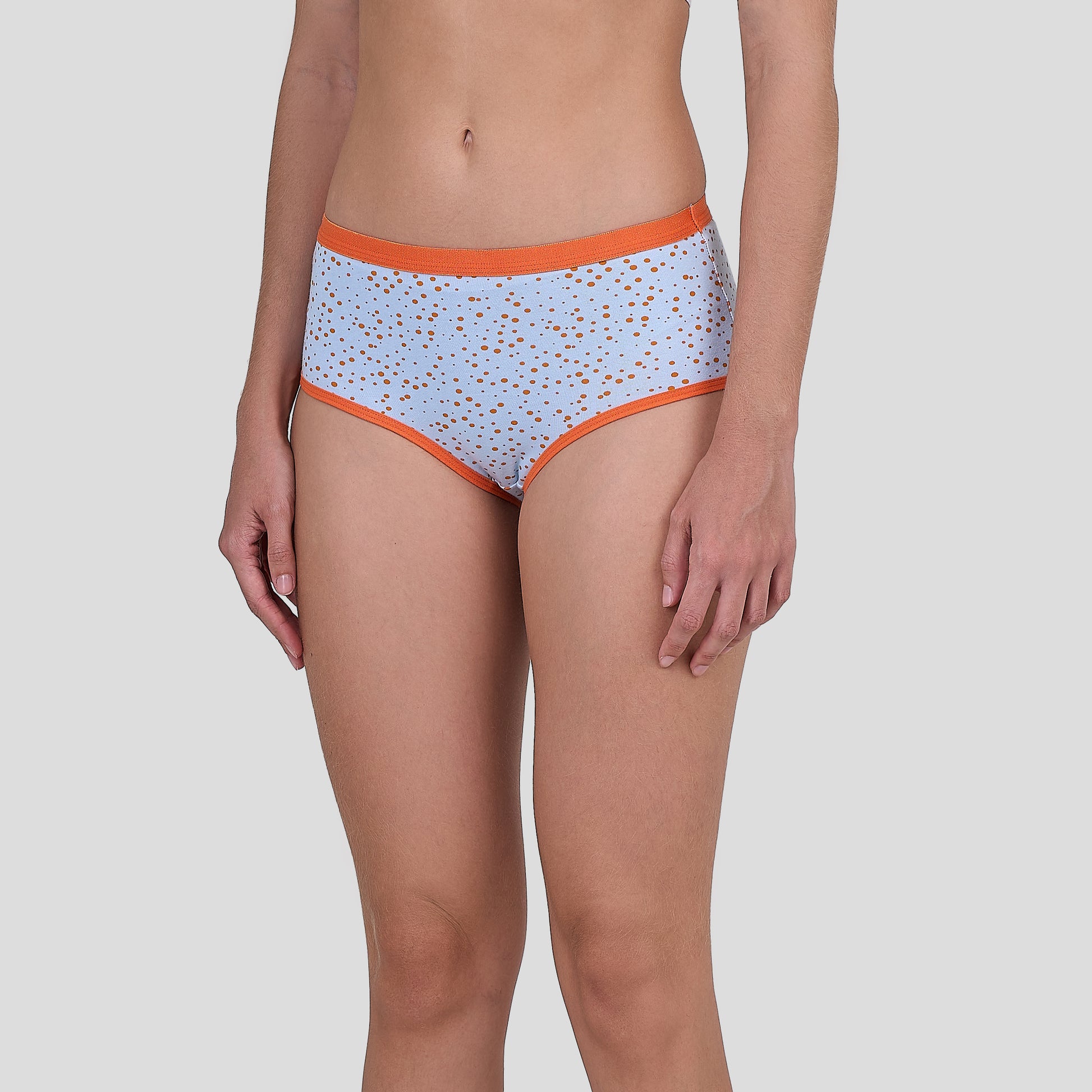 Dice Light blue patterned underwear with orange trim on a white background