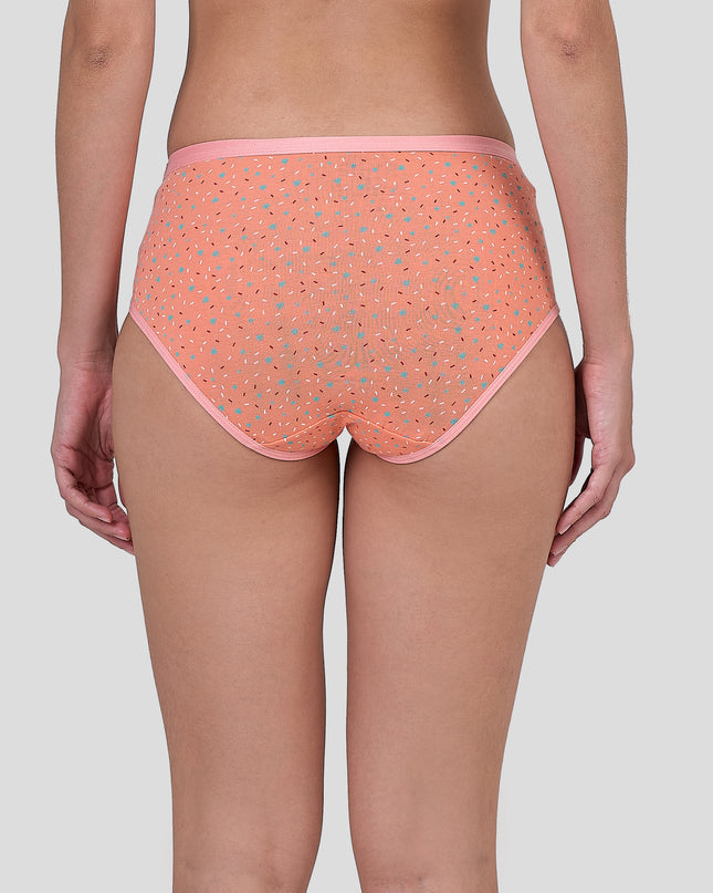 Person wearing a Dice patterned pink underwear on a plain background