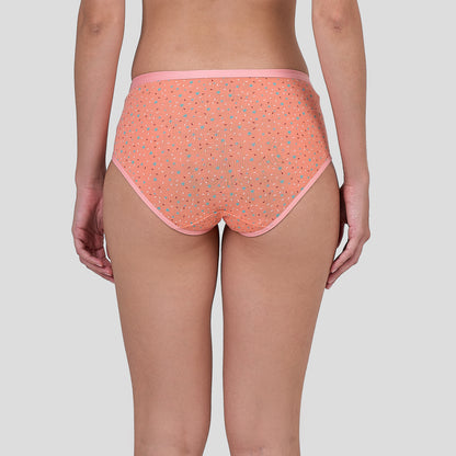 Person wearing a Dice patterned pink underwear on a plain background