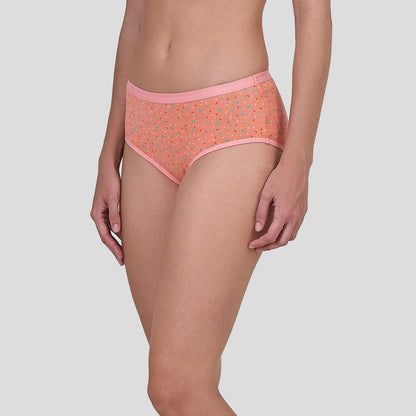 Person wearing a Dice patterned orange underwear on a plain background