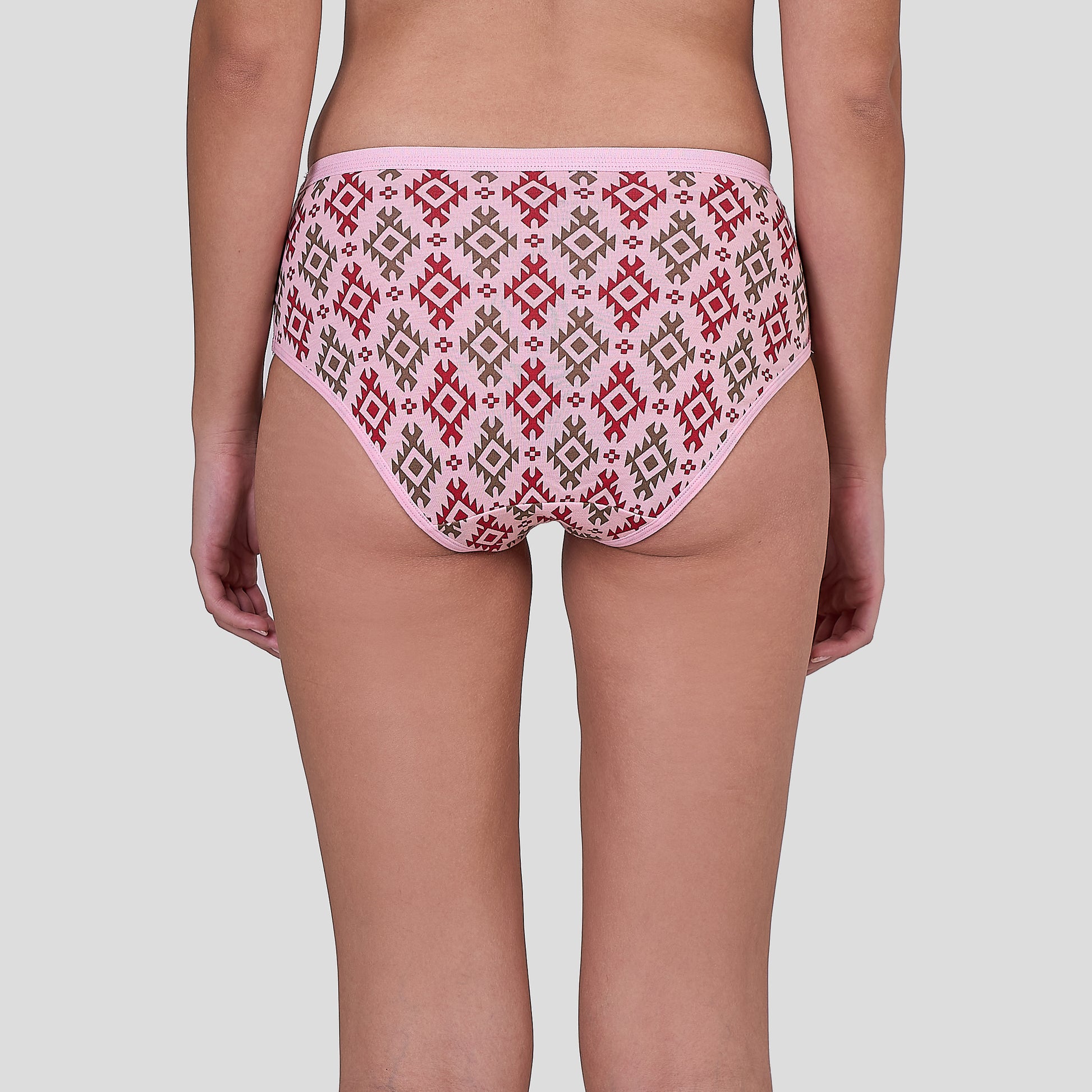 Dice Patterned underwear worn by a person on a plain background