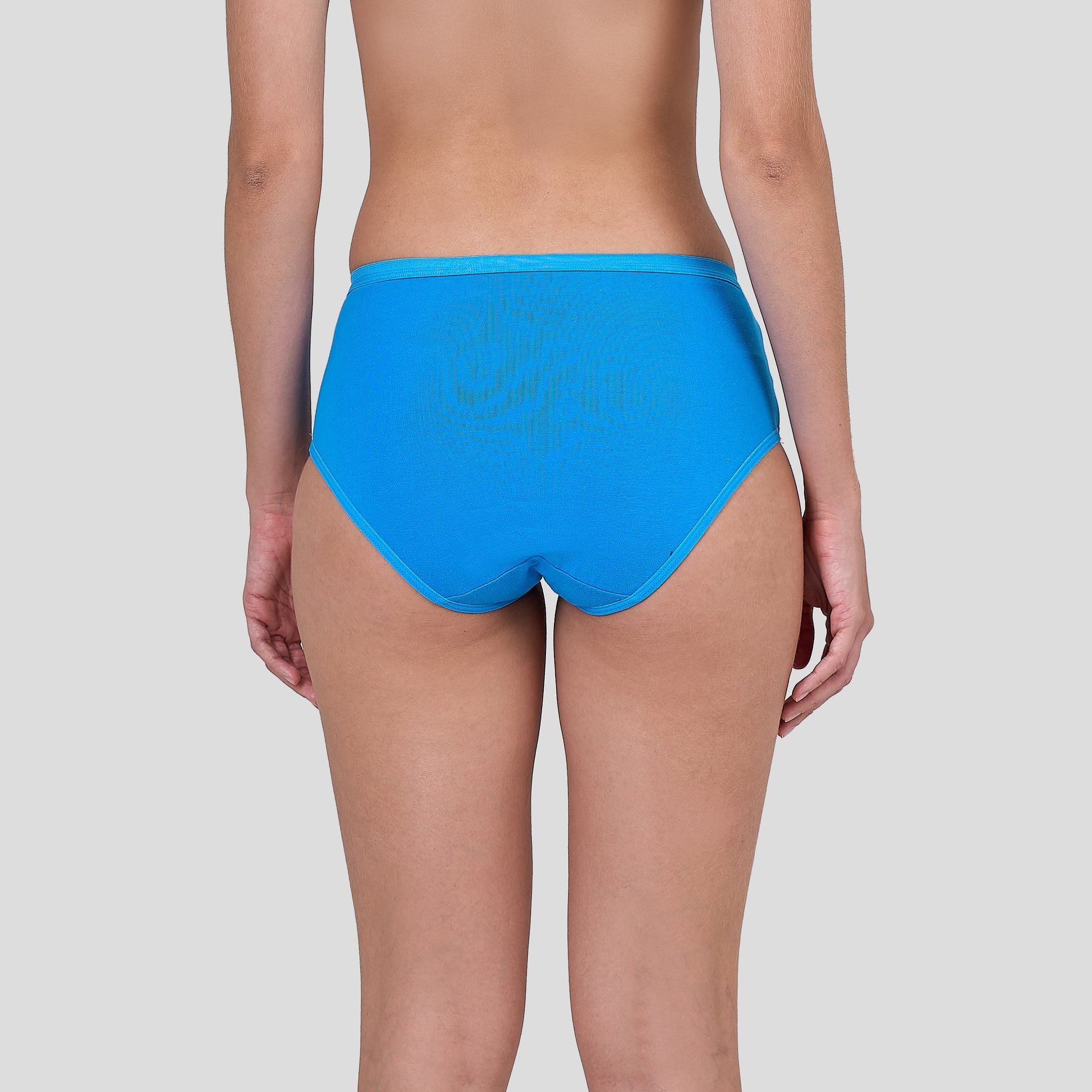 Dice Blue bikini bottom worn by a person on a plain background