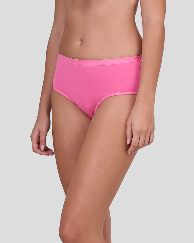 Person wearing Dice bright pink high-waisted bikini bottoms on a light gray background