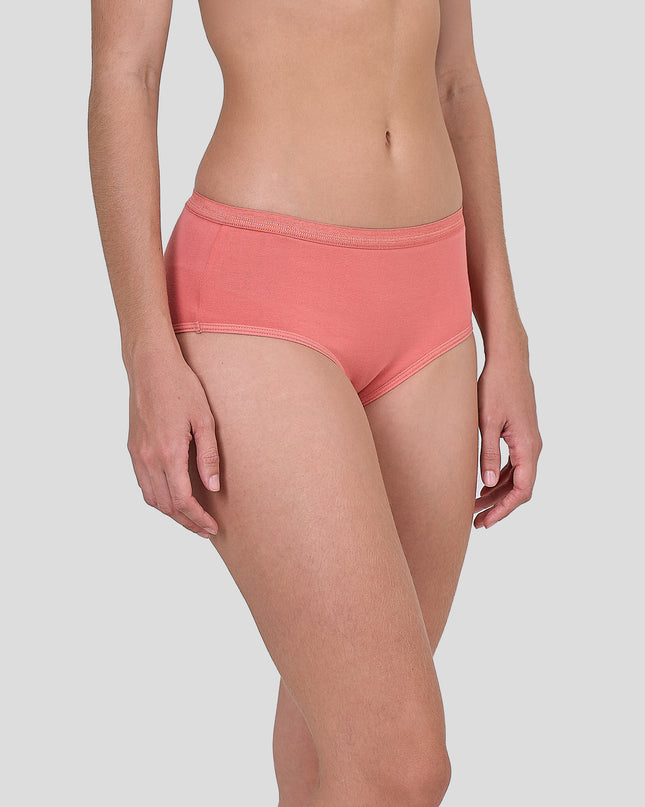 Person wearing a Dice coral pink underwear on a light gray background