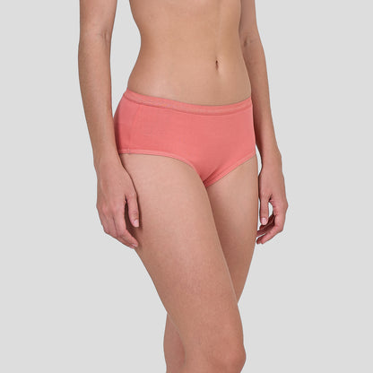 Person wearing a Dice coral pink underwear on a light gray background