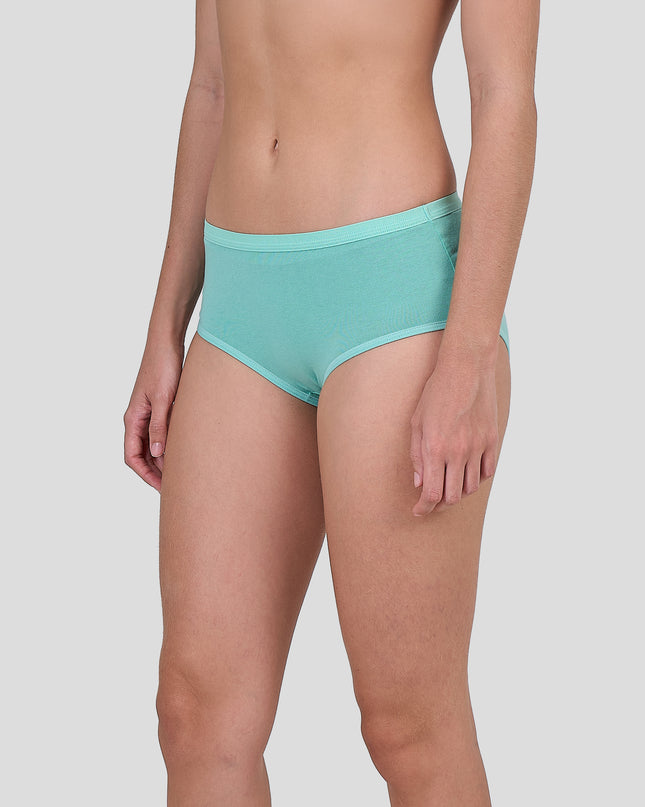 Person wearing Dice teal underwear on a plain background