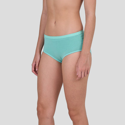 Person wearing Dice teal underwear on a plain background
