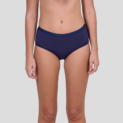 Person wearing Dice navy blue underwear on a light gray background