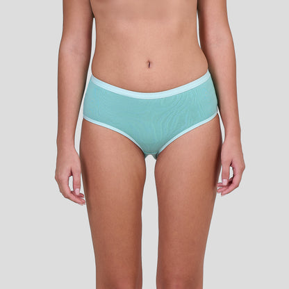 Person wearing a Dice light blue underwear on a plain background