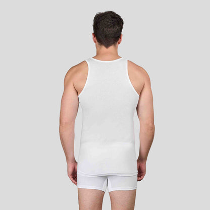 Man wearing Dice white tank top and underwear set on a plain background